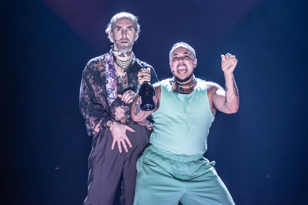 Much Ado About Nothing. Tim Steed (Don John) & Mika Onyx Johnson (Borachio) Credit Marc Brenner. 1215